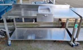 Stainless steel table on wheels - L180 x W70 x H100cm