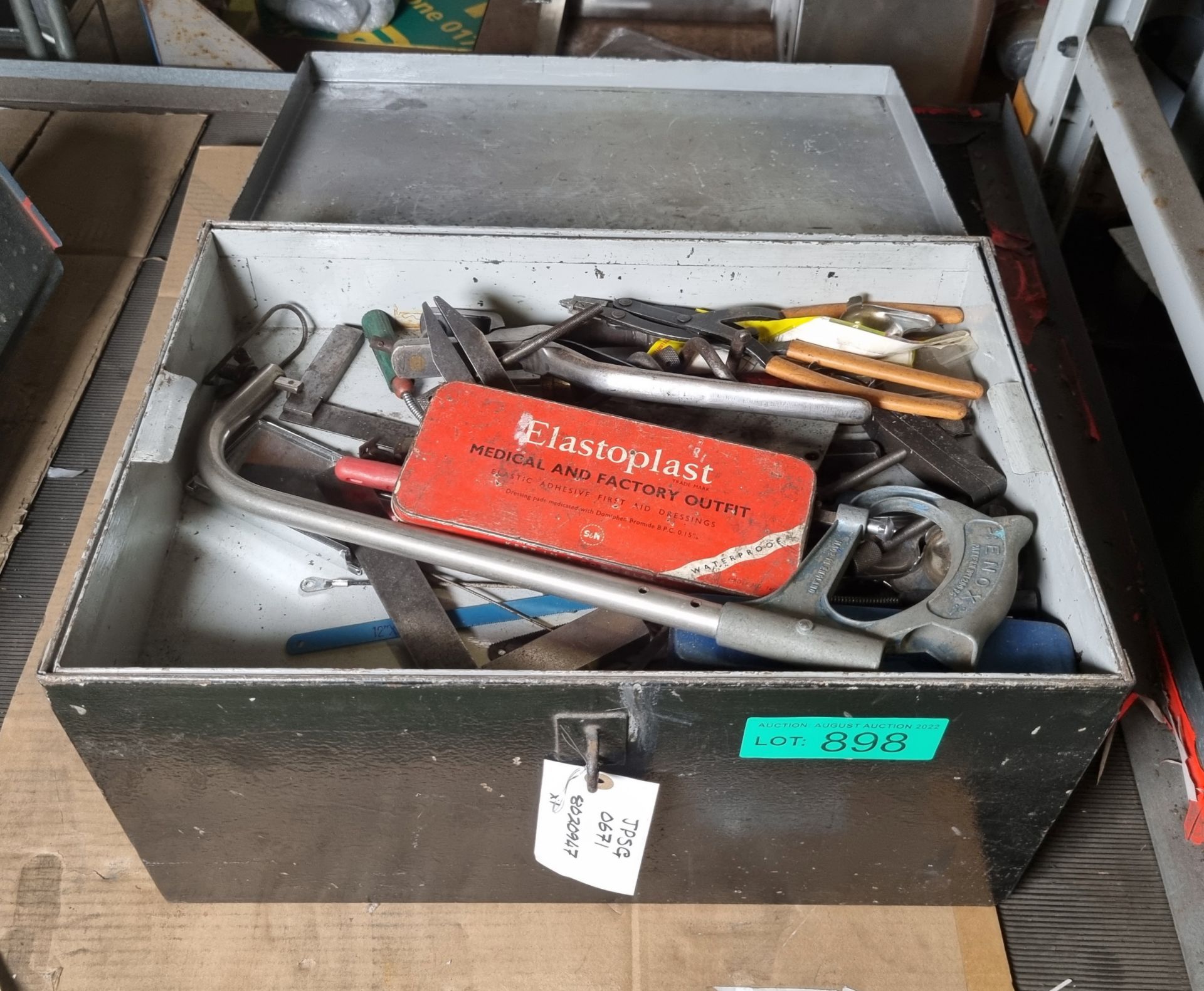 Various hand tools in metal tool box
