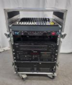 Amp rack containing the following - Soundcraft Spirit M8, Olson Distribution Panel, Furman Power Con