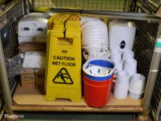 Assortment of cleaning equipment - mop handles, buckets, wet floor signs