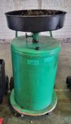 Green 4 wheeled oil drainer