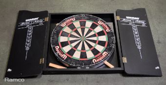 Winmau Dartboard in cabinet