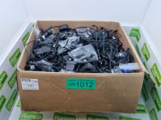 Box of assorted mobile phone chargers