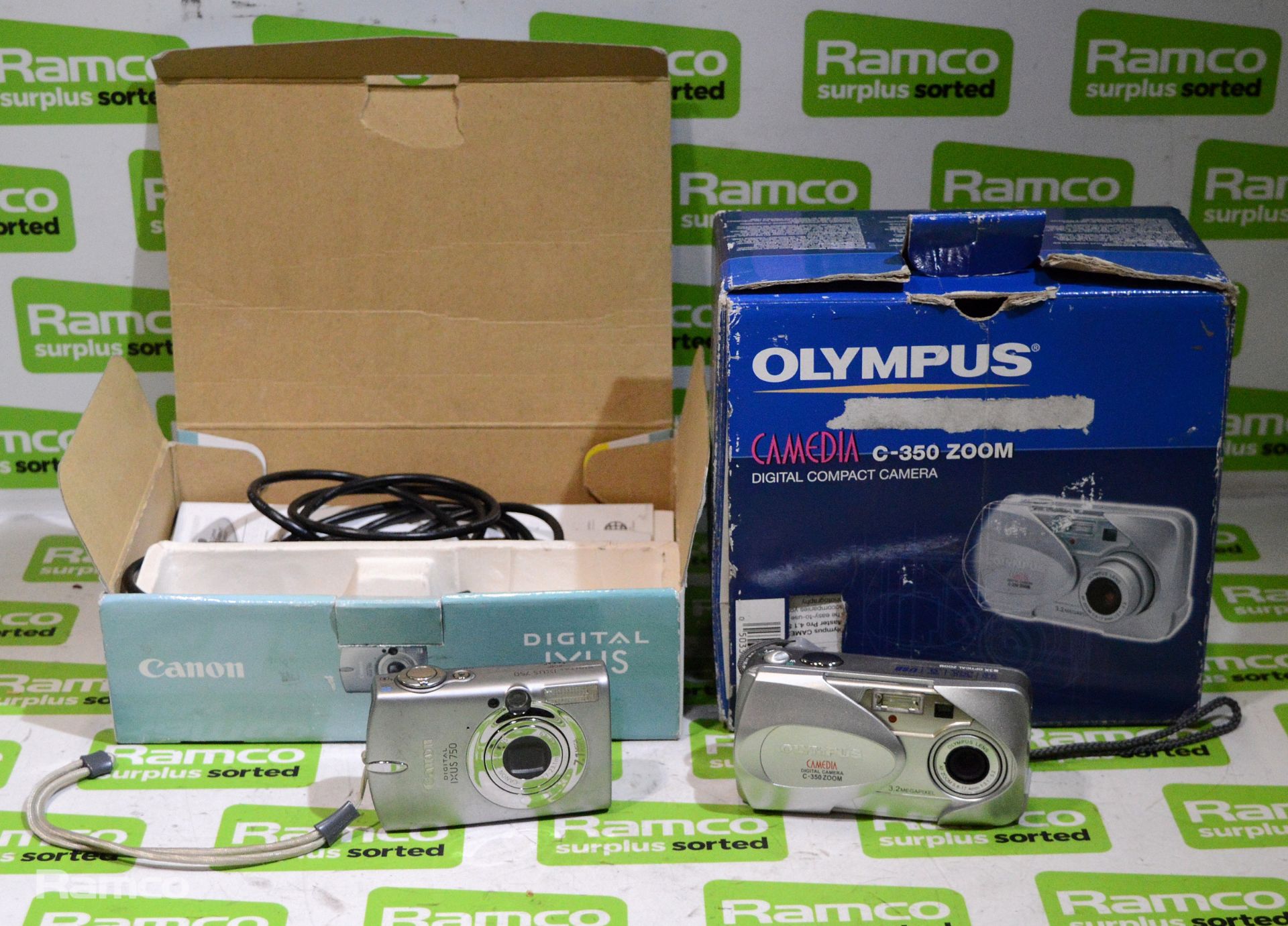 Canon IXUS 750 Digital camera, Olympus C-350 Zoom Digital camera