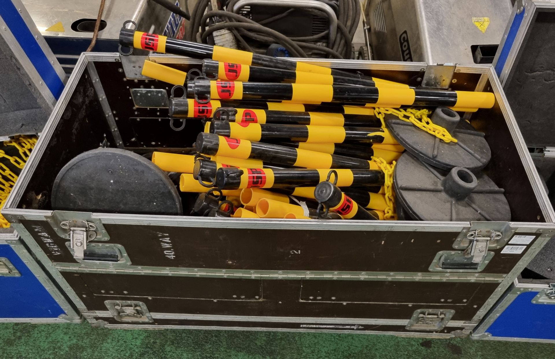 Yellow and black chain link fencing with bases in flight cases on castors - Image 2 of 6