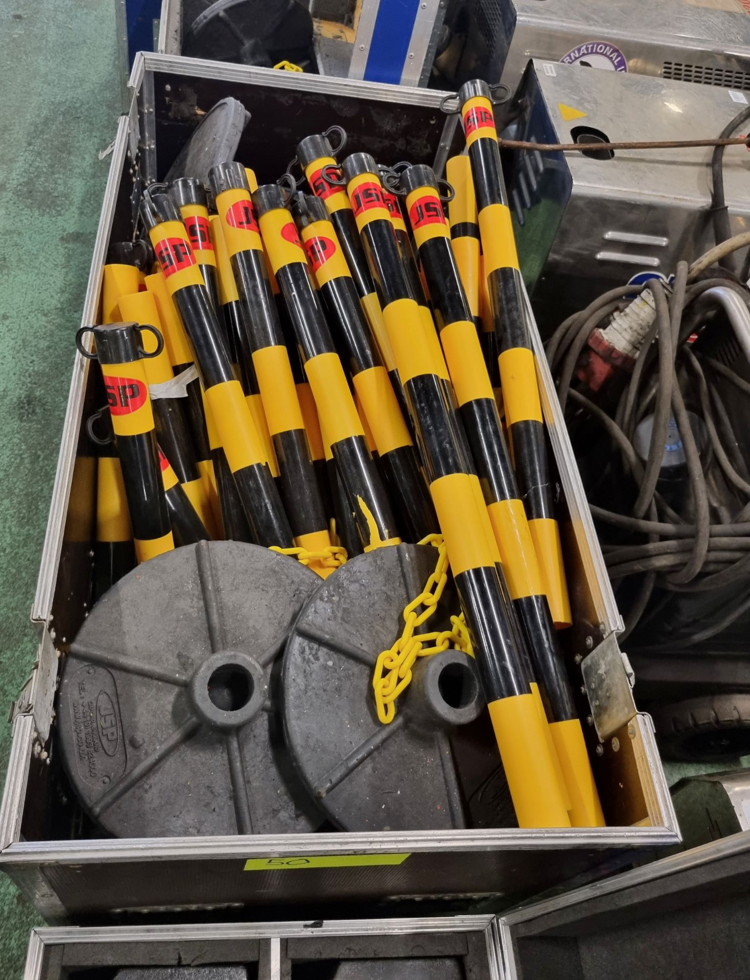 Yellow and black chain link fencing with bases in flight cases on castors - Image 3 of 6