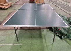 Kettler table tennis table (missing bats and net) in green cover - 276x153x76cm