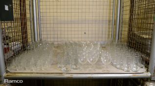 Drinking glasses of multiple types, shapes and sizes