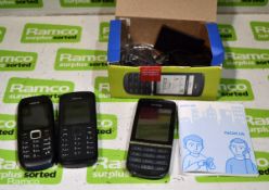 Nokia Asha 300 phone black in box with charger and accessories, Bag of 2 Nokia phones no accessories
