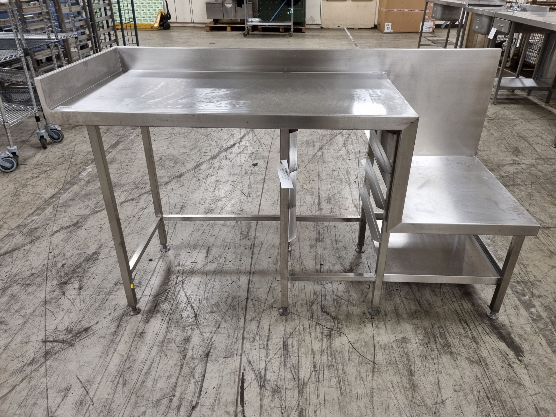 Stainless steel table with two side shelfs built in plus tray rack