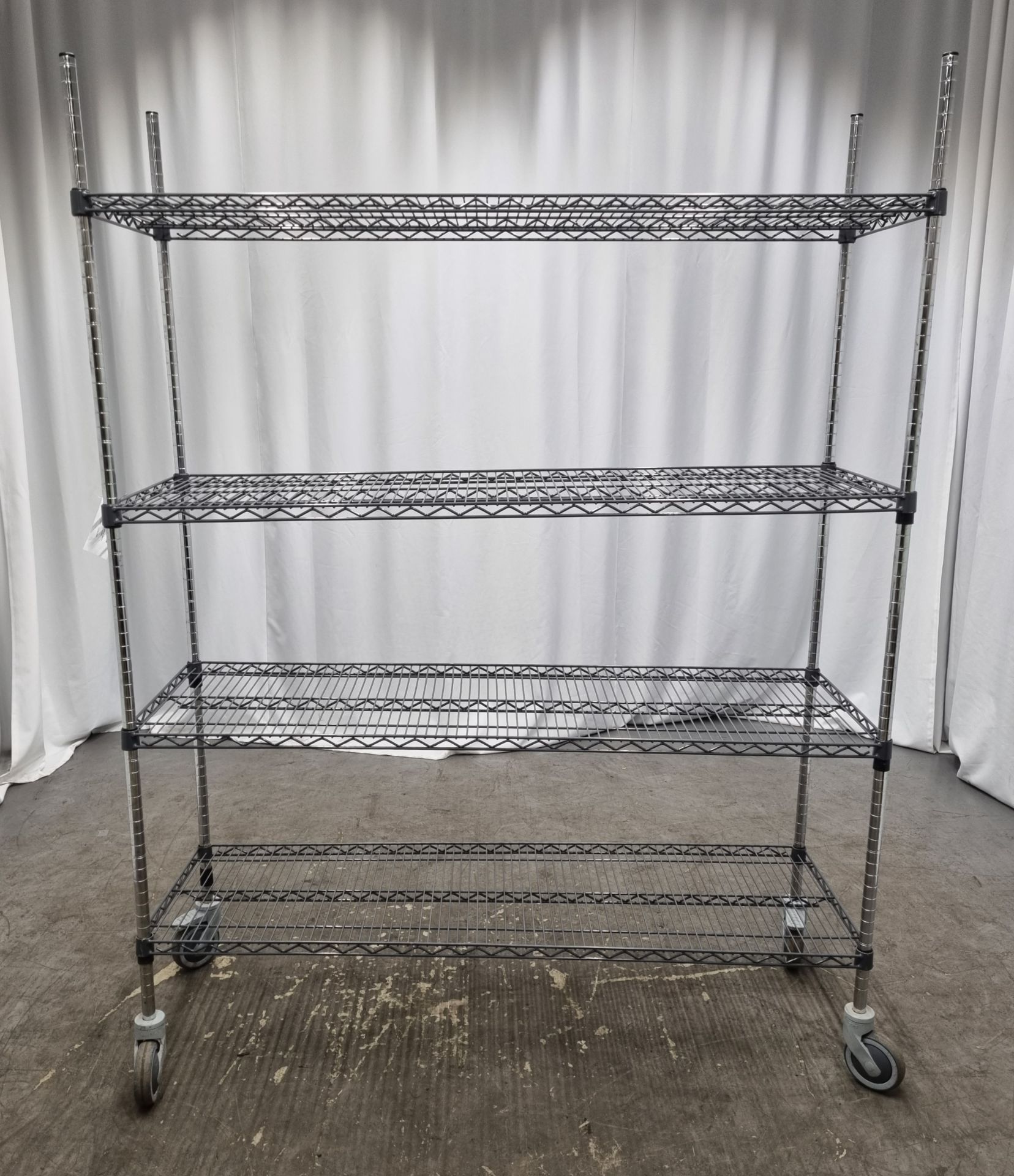 Brushed steel catering racking 4 x shelf on wheels