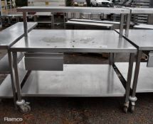 Stainless steel table on casters - 140 x 110 x 130cm with shelf