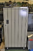 Mobile metal cream striped storage cabinet with electric power point - L71 x W84 x H139cm