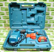 Makita cordless drill with spare 12v battery and battery charger in hard case