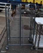 Brushed steel twin tray rack on wheels