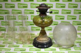 Oil lamp with spare glass chimneys