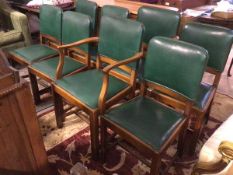 A set of eight mahogany Art Deco dining chairs, comprising two carvers and six side chairs, with