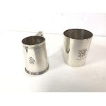 An Edwardian Chester silver presentation mug (9cm), a 1920s Birmingham silver mug (combined: 285g)
