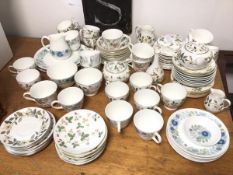 A large assortment of Wedgwood china in various patterns including Wild Strawberry, Beaconsfield,