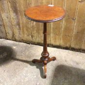 A 19thc mahogany wine table, with circular with moulded edge, on turned tripod support (74cm x