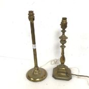 Two brass table lamps, one of baluster form, the other straight with a reeded circular base (taller: