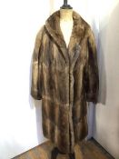 A Joseph Hyams & Son, Dominion Fur Co. Ltd., Edinburgh fur coat (tear to join of one arm to body) (