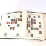 A Centurian stamp album with stamps from various countries up to c.1940, including Great Britain,