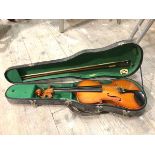 A violin with Parrot label to interior, with bow and travelling case (69cm)