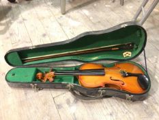 A violin with Parrot label to interior, with bow and travelling case (69cm)