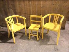 A set of children's chairs in yellow, including two armchairs and a side chair (armchair: 61cm x