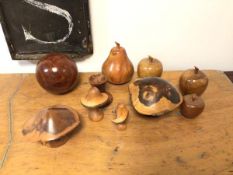A group of carved wood figures including those in the form of mushrooms and fruit (pear: 10cm) (10)