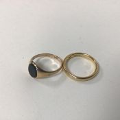An 18ct gold wedding band (P) (4.11g) and a 9ct gold ring set bloodstone (2.53g)