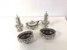A pair of Walker & Hall silver pepperettes and salts and a silver condiment pot (5)