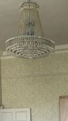 An impressive modern three tier stepped chandelier, metal painted eggshell blue, complete with