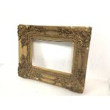 A 19thc gilt composition frame (internal: 17cm x 25cm)