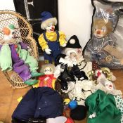 A collection of clown toys and puppets including mechanical clown playing Send in the Clowns,