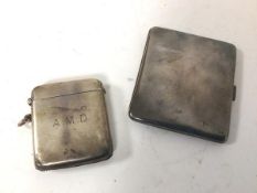 A 1920s London silver cigarette case and a Birmingham silver match case (combined: 147g)