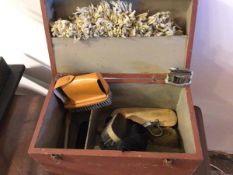 A box of shoe shine equipment, including various brushes etc. (24cm x 38cm x 22cm) and a Bronson