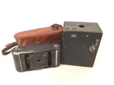 A Kodak no.2-A brownie camera (16cm x 13cm x 9cm) and another Kodak camera with original