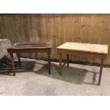 A near pair of Edwardian luggage stands, one with later plank top, one with John Taylor & Sons,
