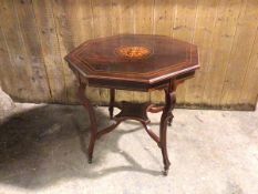 A reproduction Georgian style centre table, the octagonal top with classically inspired inlay on