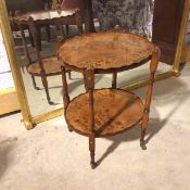 A modern Georgian inspired two tier table, with burr wood laminate top, with scalloped raised edges,