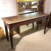 A William IV mahogany side table, the rectangular top with moulded frieze, on turned and faceted