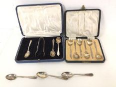 A set of six 1930s Birmingham silver coffee spoons in original box and a part set of three Edwardian