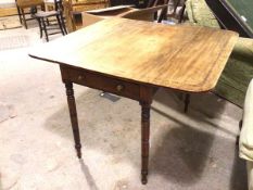 An 1820s/30s mahogany drop leaf table, the rosewood crossbanded top with moulded edge, fitted single