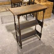 A 1930s/40s oak bookshelf with moulded rectangular top above two bookshelves, on turned supports