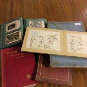 A mixed lot of books including a book of postcards, a book of Japanese coloured prints, The River