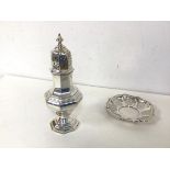 An Edwardian London silver sugar castor (20cm) and a silver pierced dish (combined: 201g)