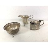A 1920s London silver footed bowl with matching milk jug and a Birmingham silver condiment pot (