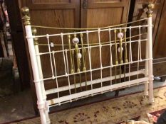 A Victorian style white painted and brass mounted spar end bed with decorative ceramic ball finials,